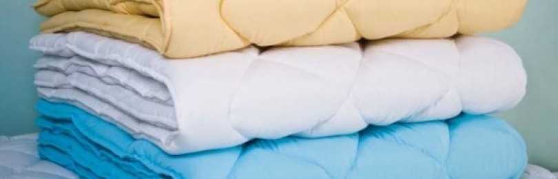 Как правильно стирать одеяла из разных наполнителей: особенности и полезные рекомендации