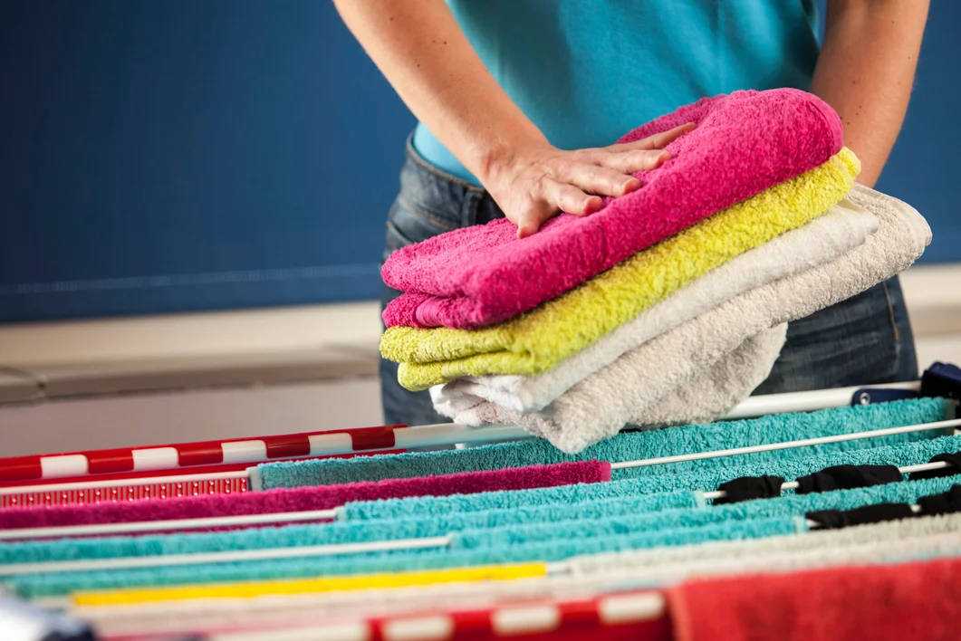 Жесткие махровые полотенца после стирки в машине-автомат: причины и способы устранения